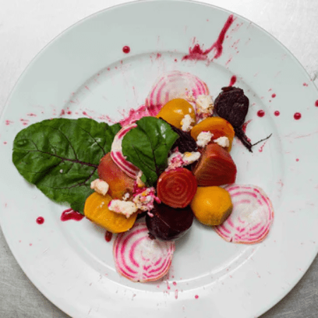 a plate with a beet salad a plate with a beet salad